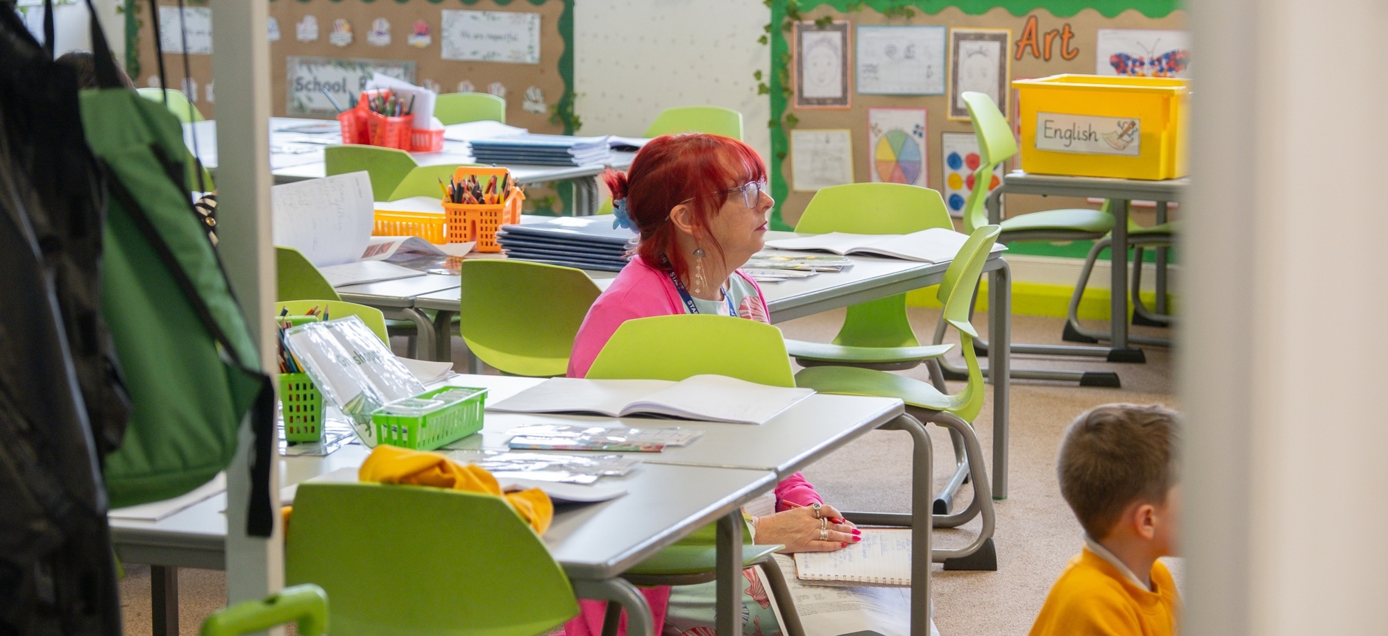 Teacher sitting observing